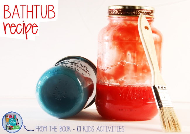 diy bathtub paint in red and blue with a paintbrush leaned up against the jar.