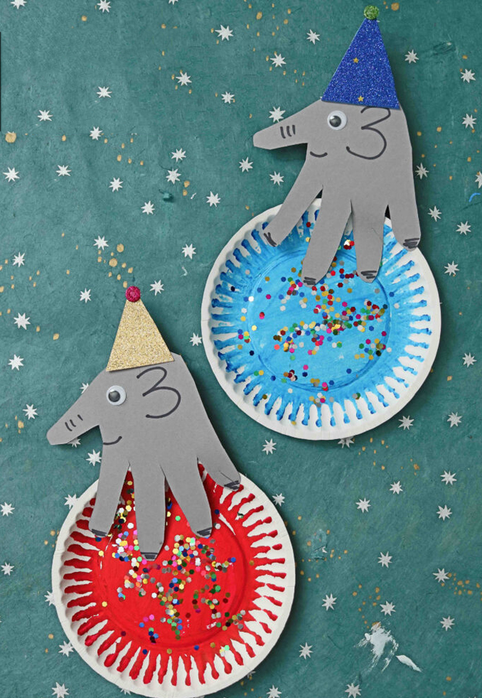 Circus Crafts and Carnival Crafts- Image shows two paper plate elephant crafts. From Glued to my crafts