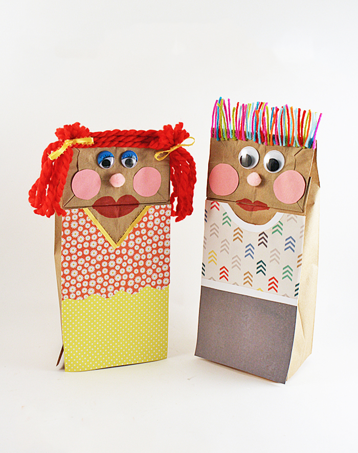 Circus Crafts and Carnival Crafts- Image shows two funny paper bag puppets. Idea from Kids activities blog