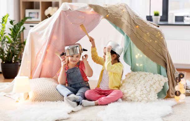 Make New Years Eve Memories- Bang Pots and Pans with kids under a pillow fort- kids activities blog
