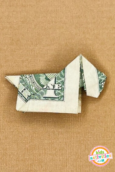 Final result - dollar bill origami dog -tutorial from kids activities blog