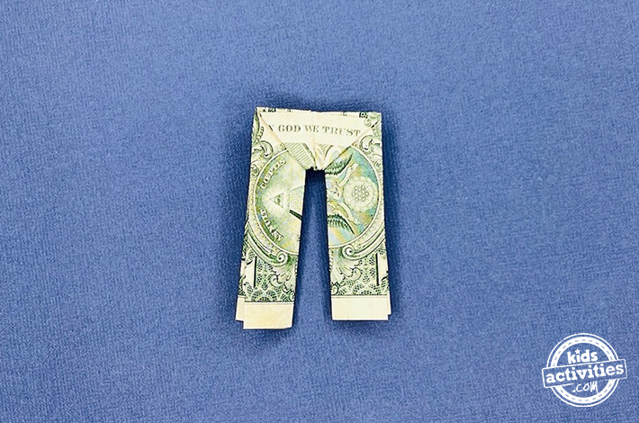 Dollar bill origami pants - Step 8 - Voila! Your stylish dollar bill origami pants are ready to display.