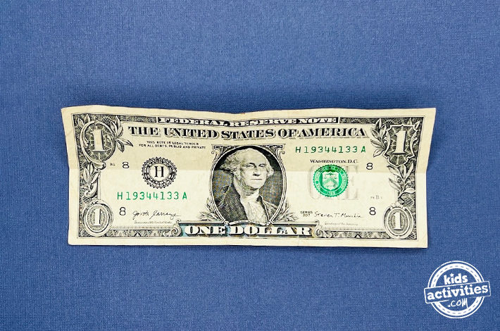 Dollar bill origami pants - Step 1 -unfold