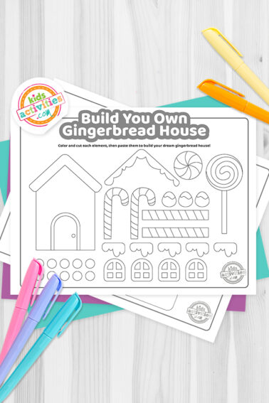 Black and white gingerbread house template on top of blue-green and purple sheets with assorted crayons on a dark grey background. printed pdf version from Kids activities blog.