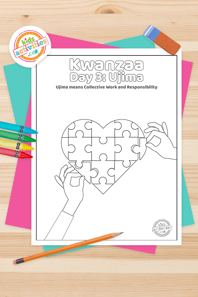 Kwanzaa Day 3 Coloring Pages printed pdf version of black and white line drawing of 2 hands putting together a heart shaped puzzled text: Kwanzaa Day 3: Ujima- Ujima means collective work and responsibility- Kids Activities Blog