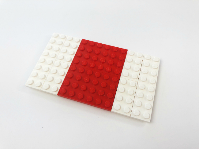 LEGO Fortnite Craft- -step 2- Place the red 6X8 and 2 - 4X8 whites onto the 6x12 from above. You want the red piece in the middle and the white on the sides. - kids activities blog
