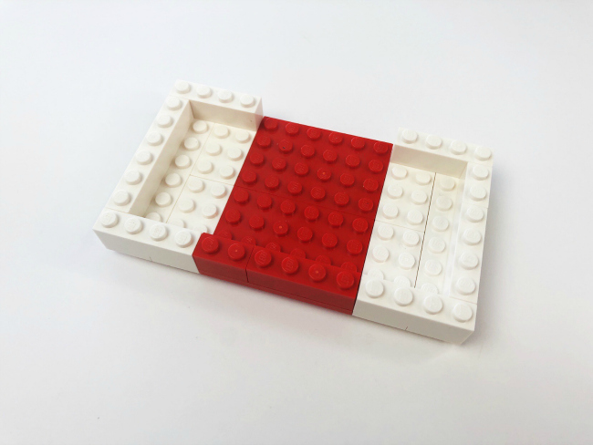 LEGO Fortnite Craft- -step 4- Make sure to put the red pieces on top of the red plate and the white pieces on top of the white plates. Leave the other side of the red plate empty for now (this will be where the hinges are attached). - kids activities blog