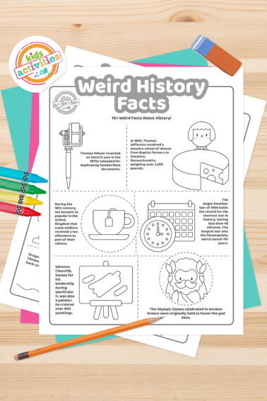 Black and white coloring pages with weird history facts lying on top of a blue-green sheet with multicolored letters on a dark grey background.