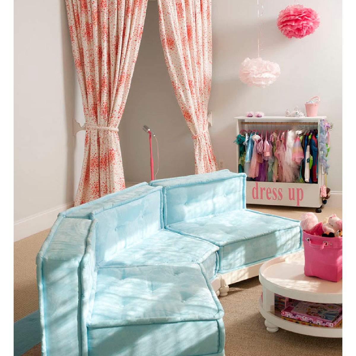 Dress up ideas- stage with blue couch and white table and pink curtains- kids activities blog