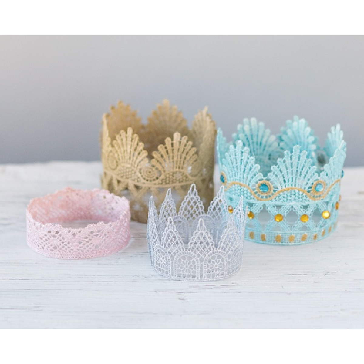 Dress up ideas- blue, gray, gold, and pink lace princess crowns- kids activities blog