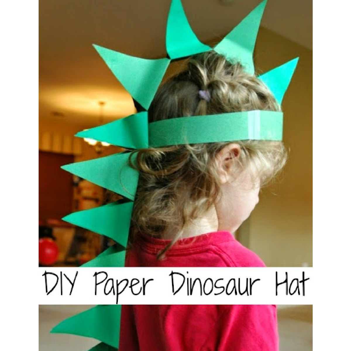 Dress up ideas- green dinosaur hat worn by little girl- kids activities blog